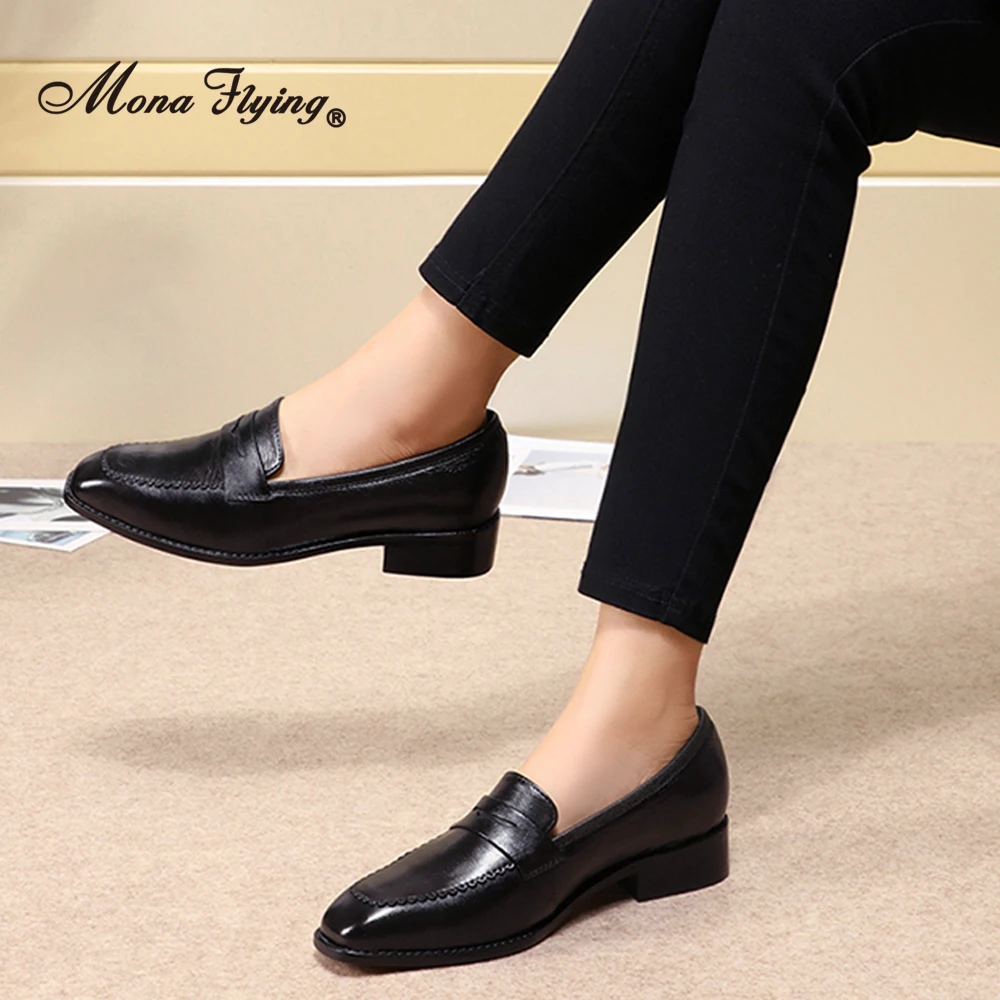 Woman trying on properly sized loafers with adequate toe box width