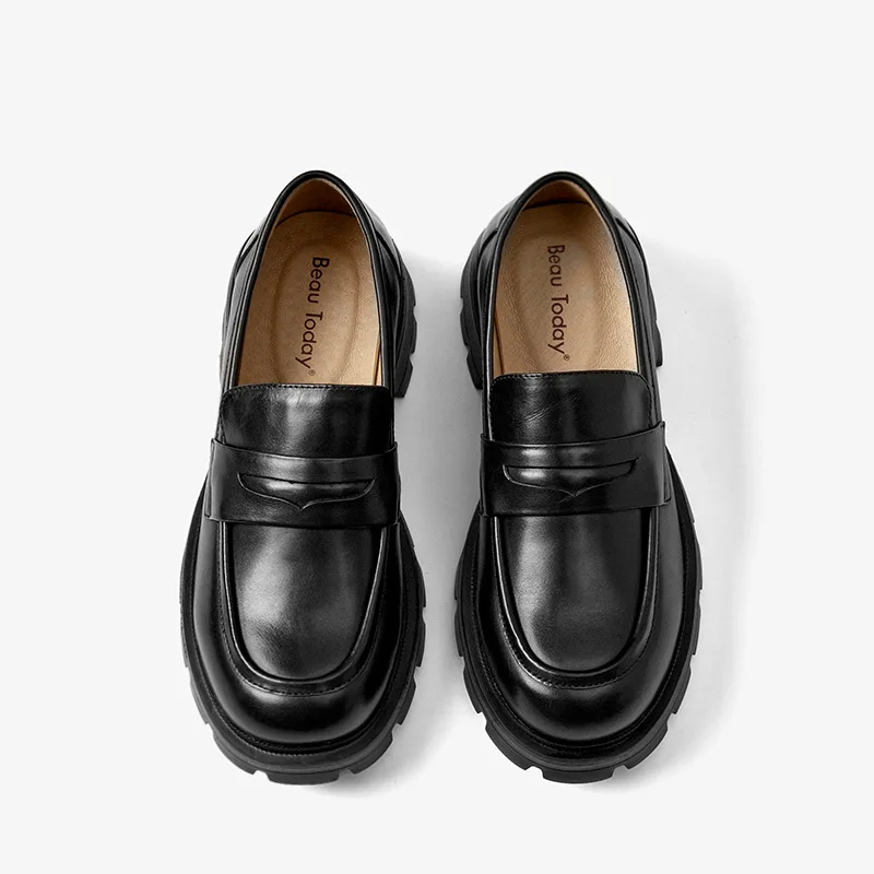 Professional black penny loafers for business settings