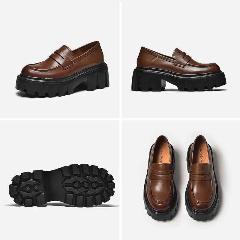Platform penny loafers creating stylish contrast with black jeans