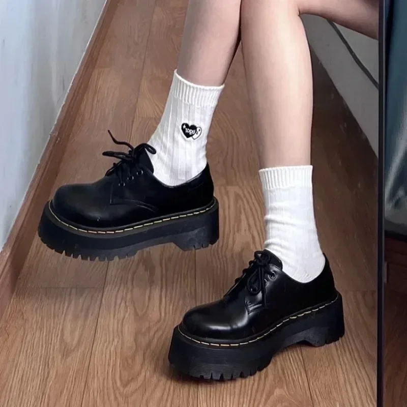 Platform black loafers styled for various everyday occasions from casual to business