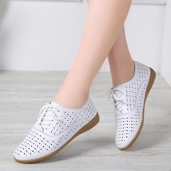 Pointed toe black leather loafers for professional business casual outfits