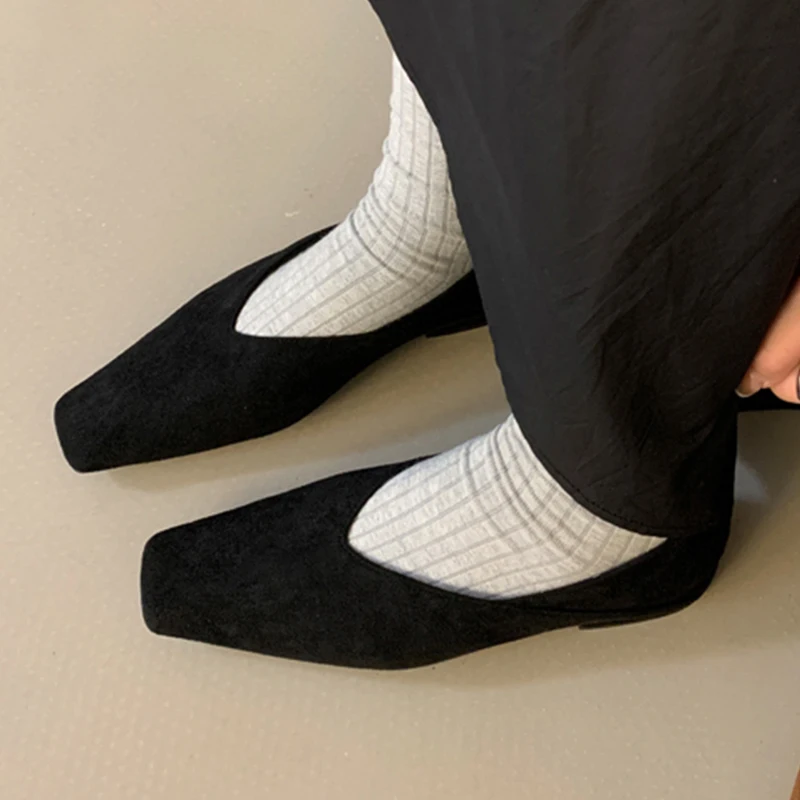Square toe flat loafers that perfectly complement various jean styles