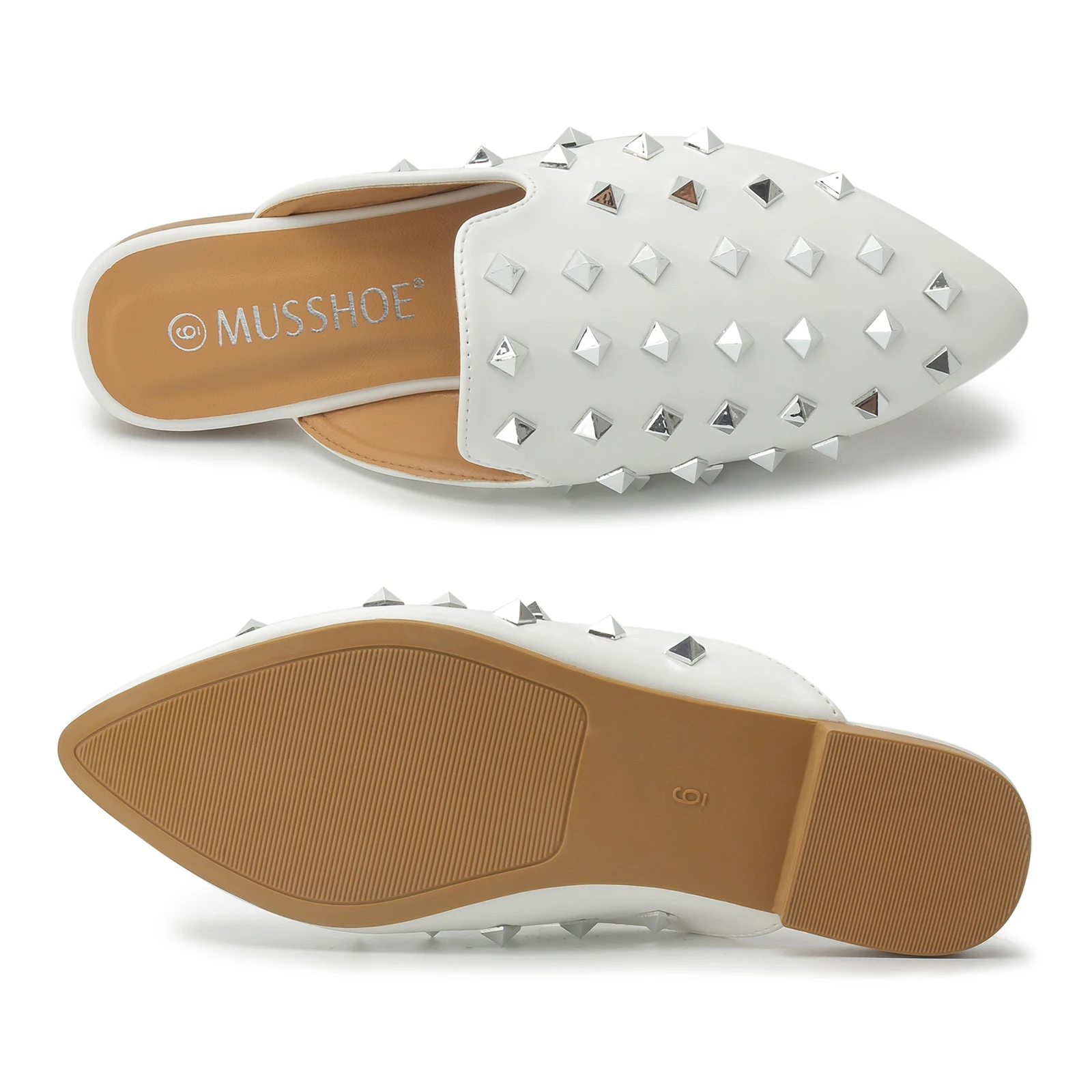 Stylish pointed toe loafer mules elegantly paired with straight-leg jeans