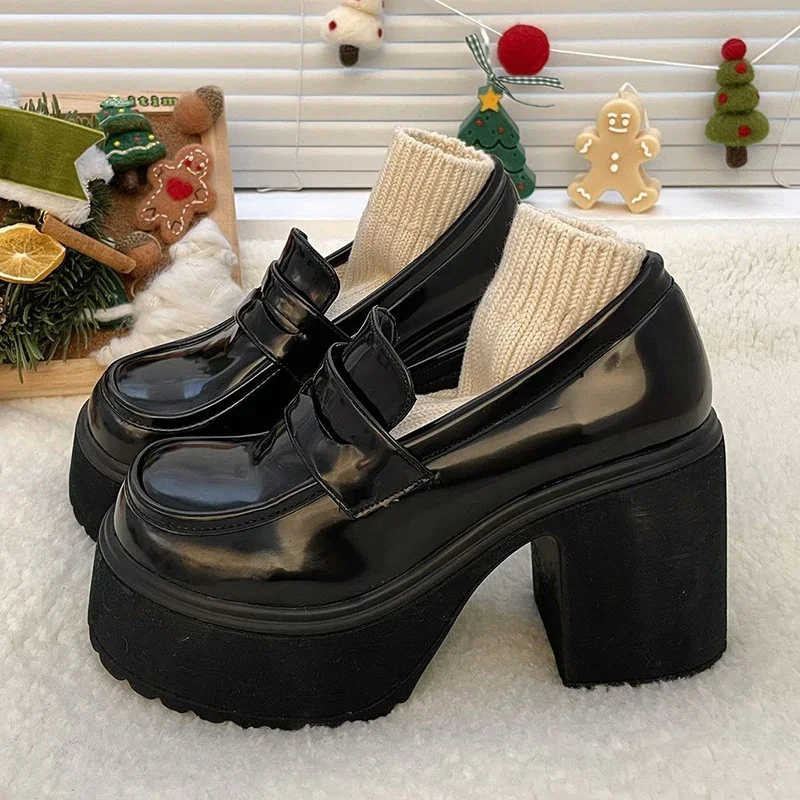 Contemporary black platform loafers styled with casual outfits for modern street style