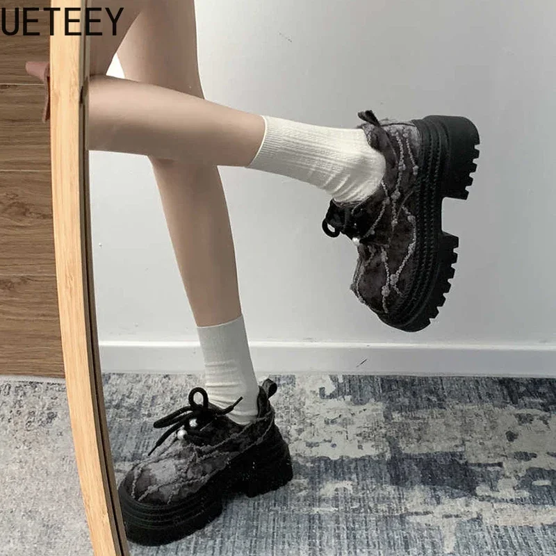Platform loafers with lace-up design showing detailed construction