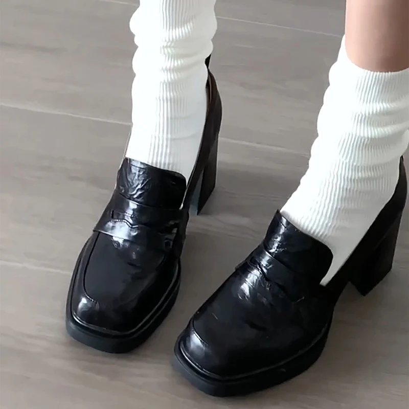 Square heel loafers demonstrating the comfort and stability of block heels for all-day wear