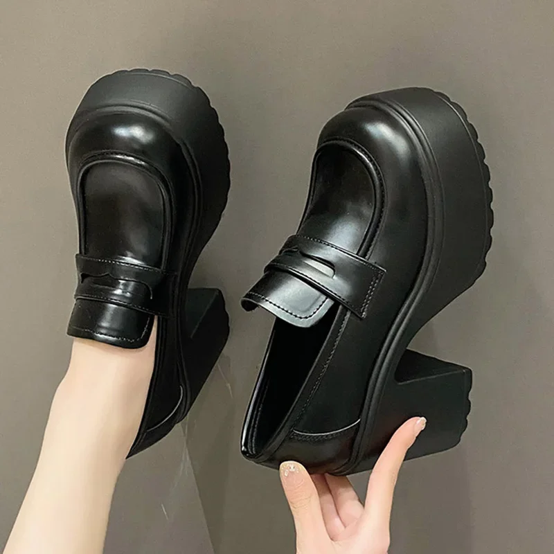 Chunky platform loafers with round toe and substantial square heel for year-round bold styling
