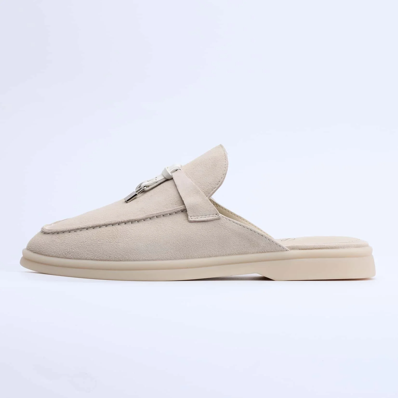 Contemporary pointed toe loafers showcasing elegant profile and fine detailing