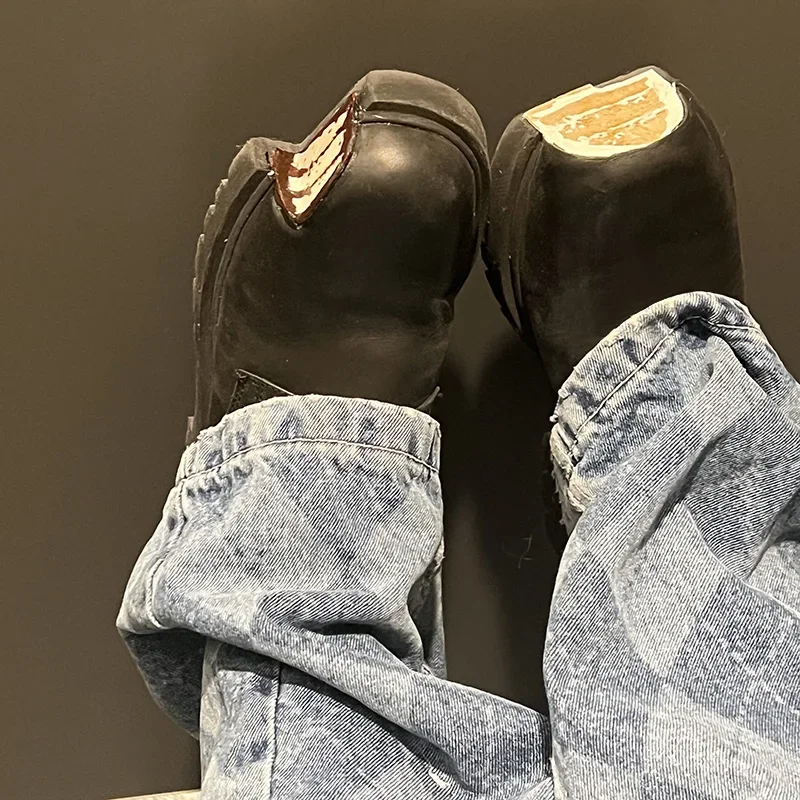 Versatile black platform loafers as wardrobe staples