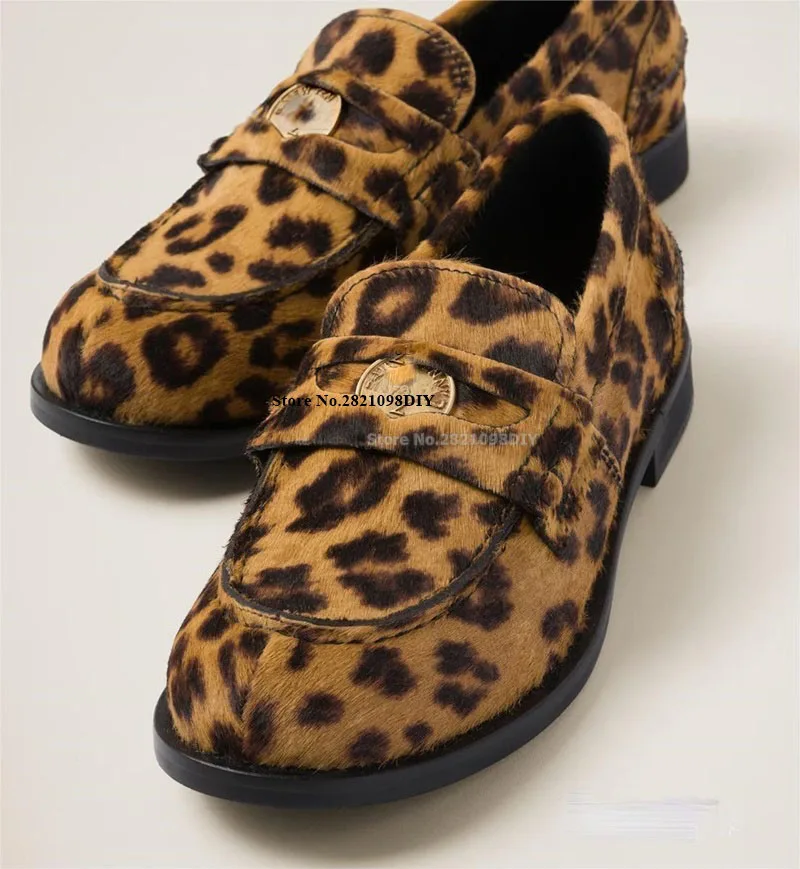 Stylish leopard print loafers paired with casual jeans for a fashion-forward combination