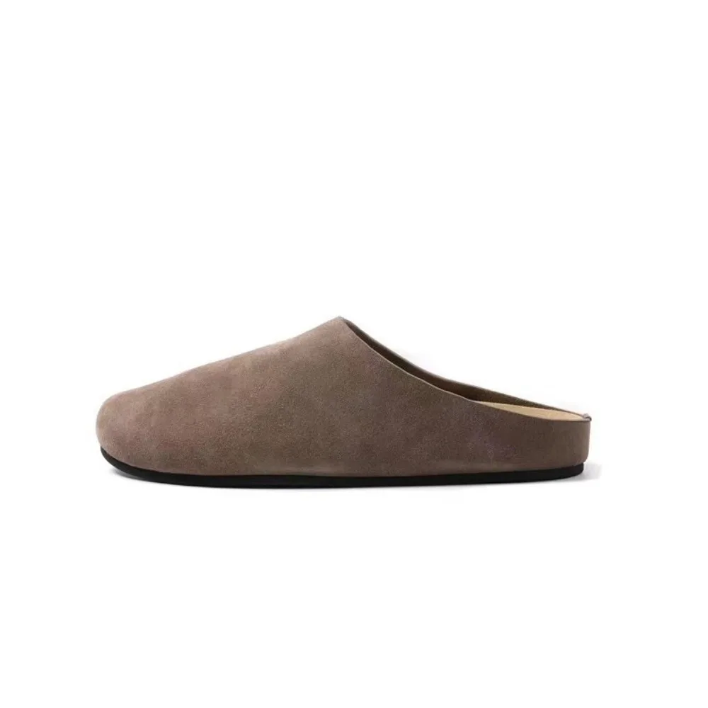 Suede mule loafers styled for casual seasonal versatility