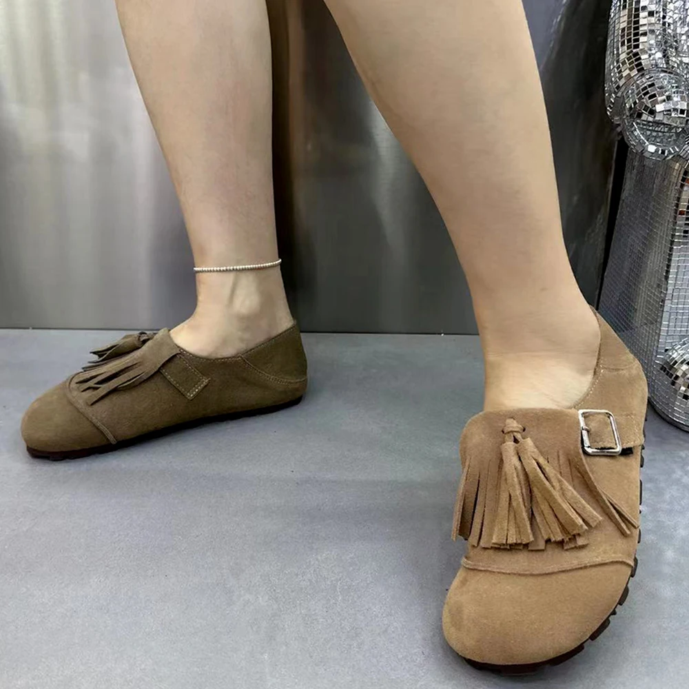 Classic patent leather tassel loafers for versatile day-to-evening professional styling