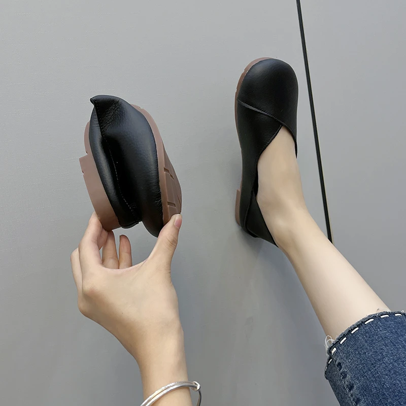 Contemporary round toe loafers with modern metal hardware elements