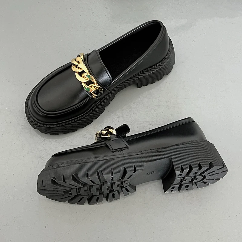 Classic leather black loafers styled for business casual and office settings