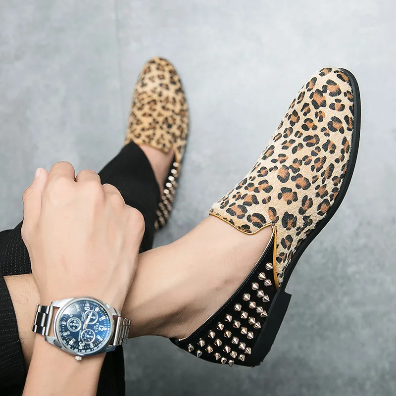 Leopard print suede loafers bringing a bold pattern element to platform loafer styling