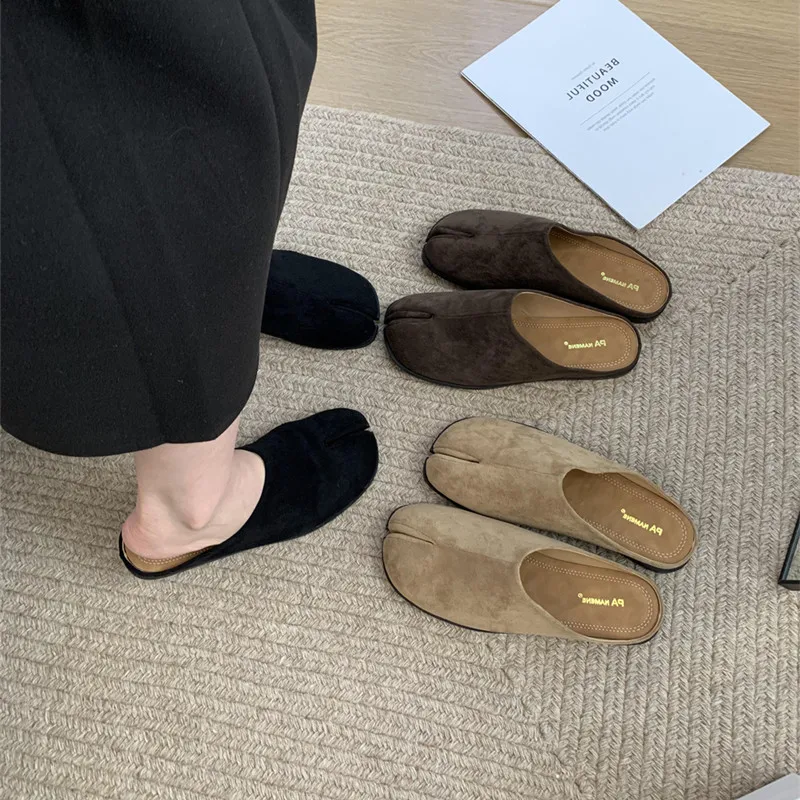 Cozy winter styling with fur-lined mule loafers