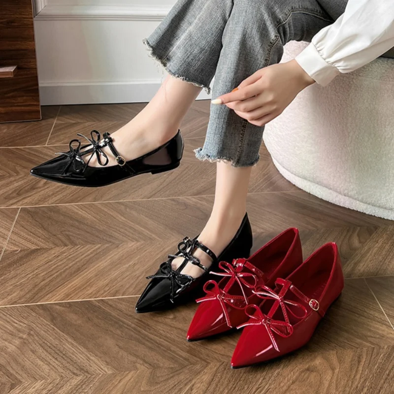 Pointed toe slingback flat with bow detail suitable for autumn styling with socks